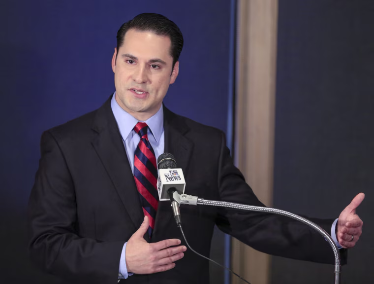 Image: Heath Mello speaks during a debate