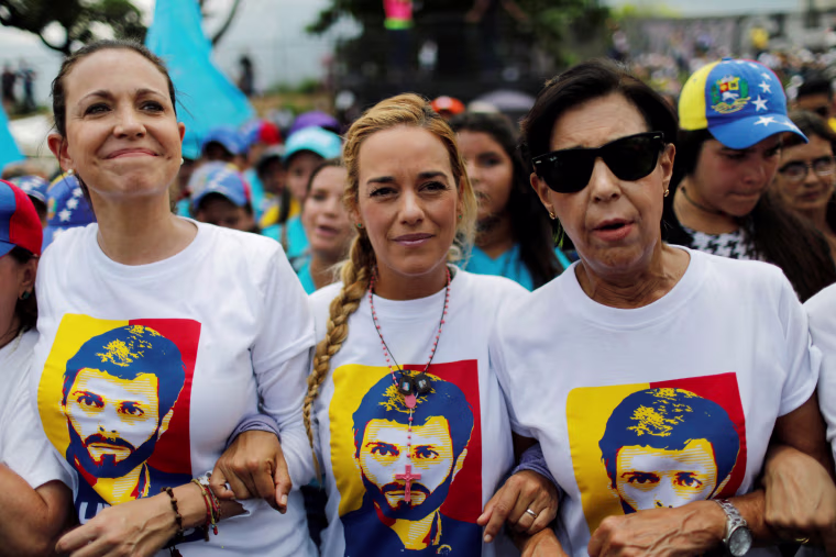 Image: Venezuelan opposition leader Maria Corina Machado, Lilian Tintori, wife of jailed opposition leader Leopoldo Lopez and Leopoldo's mother Antonieta Mendoza