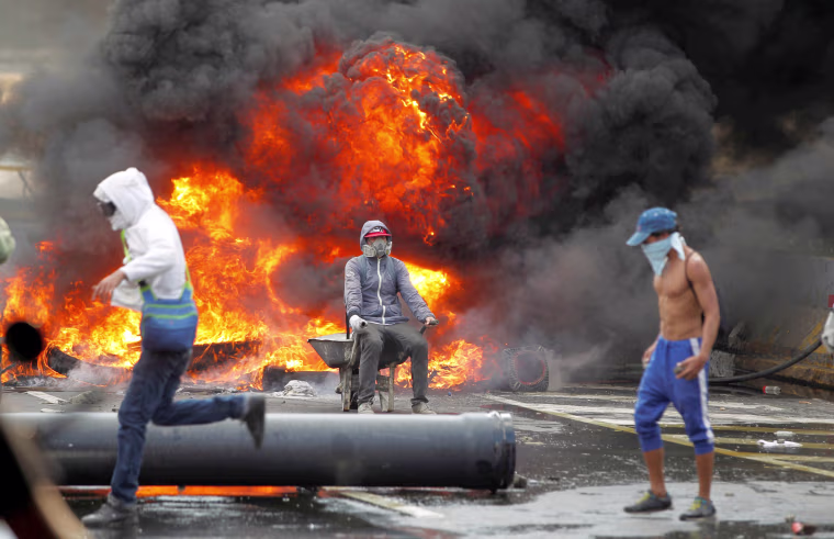 Image: Demonstrators build a fire barricade on a street during a rally against Venezuela's President Nicolas Maduro in Caracas, Venezuela, April 24, 2017.