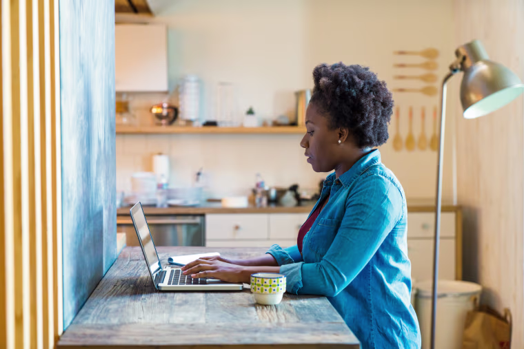 Image: Young woman studying at home