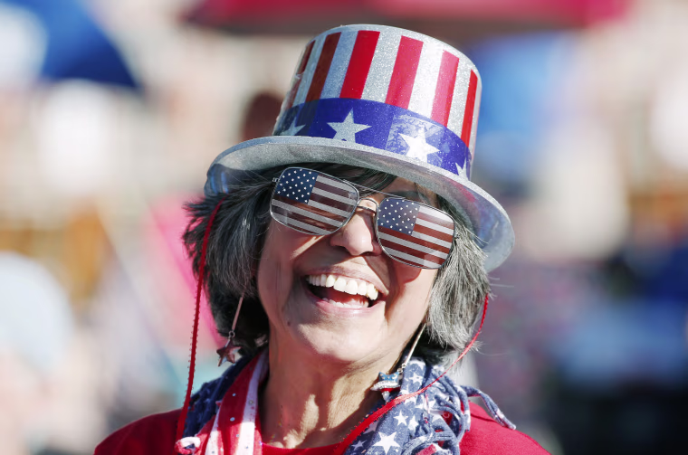 Image: Maryann Rollings, of Bolton, Mass., wears patriotic gear before rehearsal for the annual Boston Pops Fireworks Spectacular