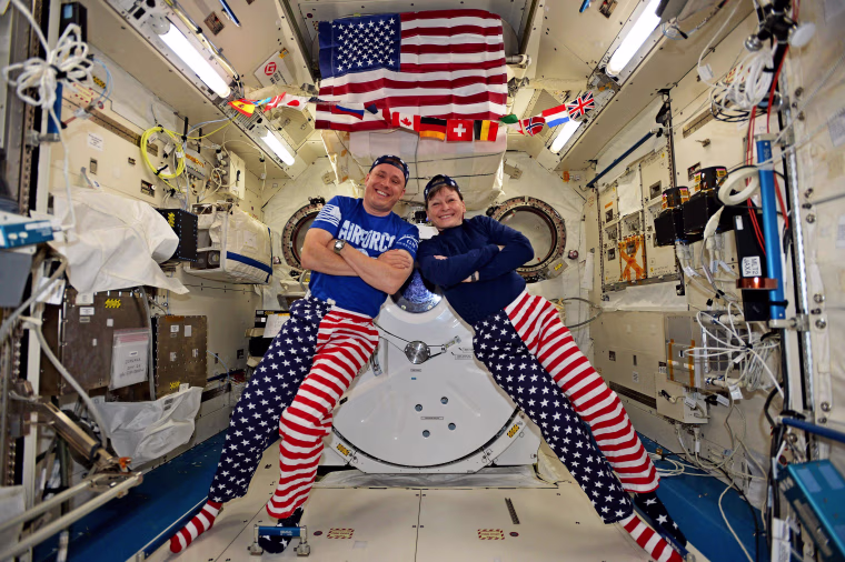 Image:  NASA astronauts Jack Fischer and Peggy Whitson celebrating the Fourth of July from over 250 miles above Earth