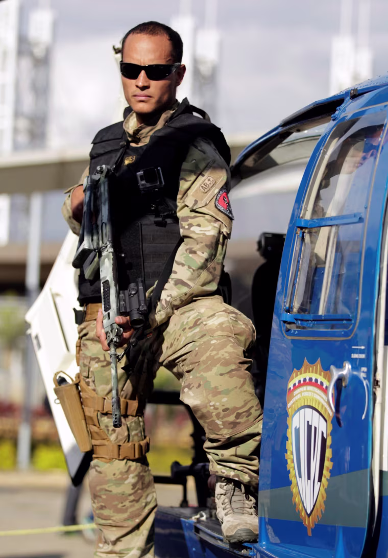 Image: Police official Oscar Perez poses for photographs during an event of the Body of Scientific, Penal and Criminal Investigation in Caracas