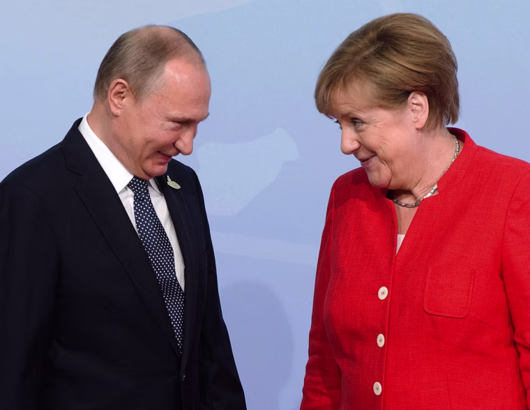 Image: Vladimir Putin, Angela Merkel