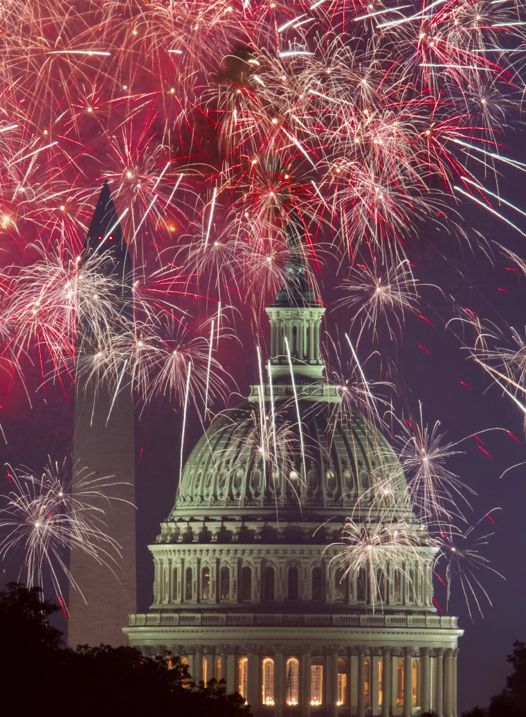 Image: Fireworks explode over the National Mall in Washington