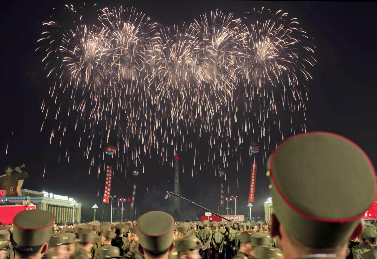 Image: Soldiers watch fireworks in Kim Il Sung Square in Pyongyang