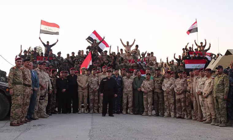 Image: Iraqi Prime Minister Haider al-Abadi declares the liberation of Mosul