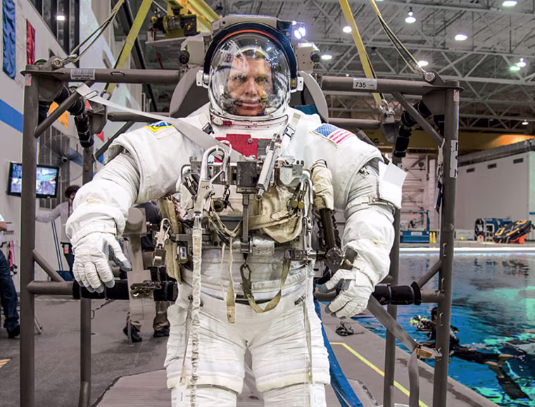 Terry Virts prepares for spacewalk training in the Neutral Buoyancy Laboratory at Johnson Space Center in Houston.