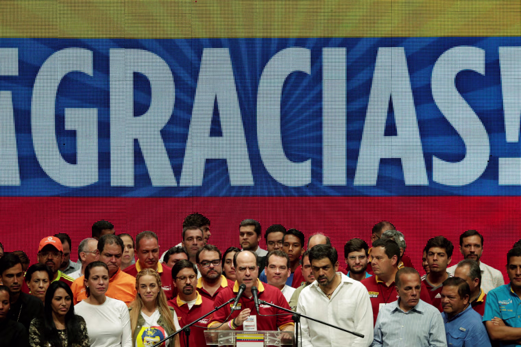 Image: Borges addresses the media after an unofficial plebiscite against President Nicolas Maduro's government and his plan to rewrite the constitution, in Cara