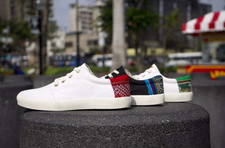 PATOS shoes are handcrafted in Peru by local artisans, with "traditional textiles" stitched onto the heels.