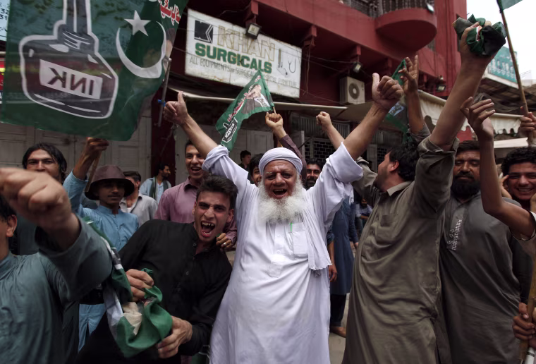Image: Opponents of Nawaz Sharif cheer Friday's ruling