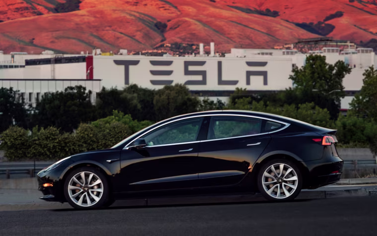 Image: First production model of Tesla Model 3 out the assembly line is seen in this undated handout photo from Tesla Motors