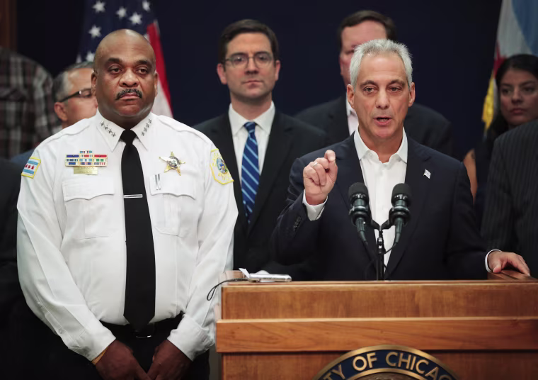 Image: Chicago Mayor Rahm Emanuel, right, stands with Chicago Corporation Counsel Ed Siske, center, and Chicago Police Department (CPD) Superintendent Eddie Johnson as he announces that the City of Chicago will file a federal lawsuit