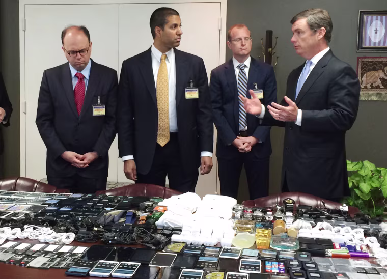 Image: Hundreds of cellphones are displayed after they were seized in a raid from the Lee Correctional Institution, S.C.
