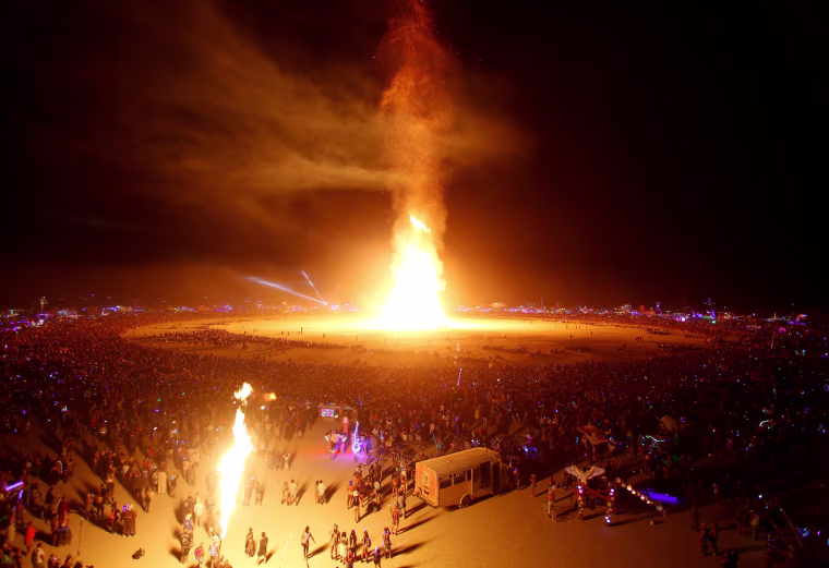 Image: The Man is engulfed in flames as approximately 70,000 people from all over the world gathered for the annual Burning Man arts and music festival in the Black Rock Desert of Nevada