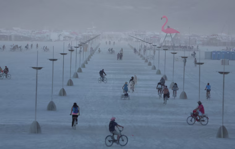 Image: Participants explore the playa as approximately 70,000 people from all over the world gathered for the annual Burning Man arts and music festival in the Black Rock Desert of Nevada