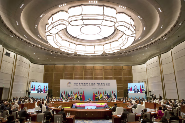 Image: Leaders attend the Dialogue of Emerging Market and Developing Countries