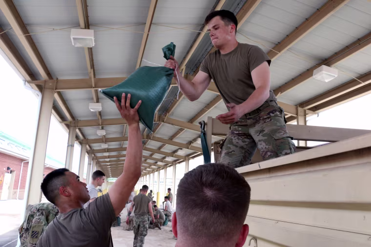 Image: In this U.S. Army handout, Soldiers of 1st Battalion, 30th Infantry Regiment, 2nd Infantry Brigade Combat Team, 3rd Infantry Division, prepare for Hurricane Irma, Sept. 8, 2017 at Fort Stewart, Georgia.
