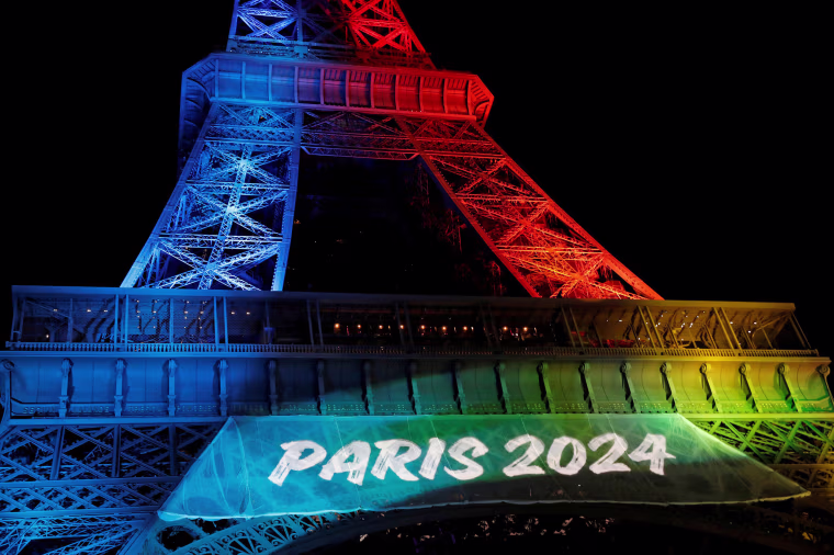 Image: The Eiffel Tower is Lit in the Colors of the Olympic Flag