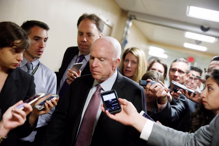 Image: Sen. John McCain (R-AZ) speaks with reporters ahead of the party luncheons on Capitol Hill in Washington
