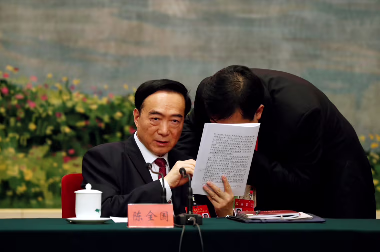 Image: Xinjiang Uyghur Autonomous Region (XUAR) Party Secretary Chen Quanguo, attends a group discussion session on the second day of the 19th National Congress of the Communist Party of China at the Great Hall of the People in Beijing