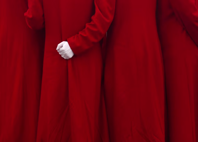 Image: Ushers pose for photos at the Tiananmen Square during the opening of the 19th National Congress of the Communist Party of China at the Great Hall of the People in Beijing