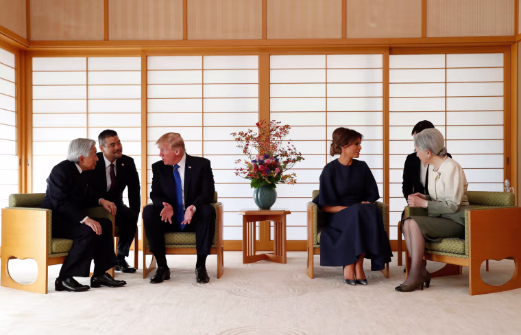 Image: Japan's Emperor Akihito, left, speaks with Trump, while First Lady Melania Trump talks with Empress Michiko at the Imperial Palace on Nov.6.