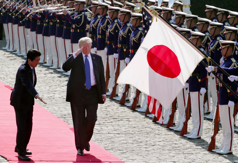 Image: President Trump reviews an honor guard during a welcome ceremony with the prime minister at Akasaka State Guest House on Nov.6.