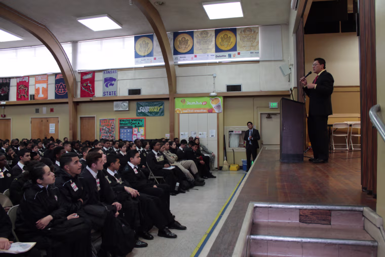 Steven Ma speaks at a college application seminar hosted by ThinkTank Learning in California.