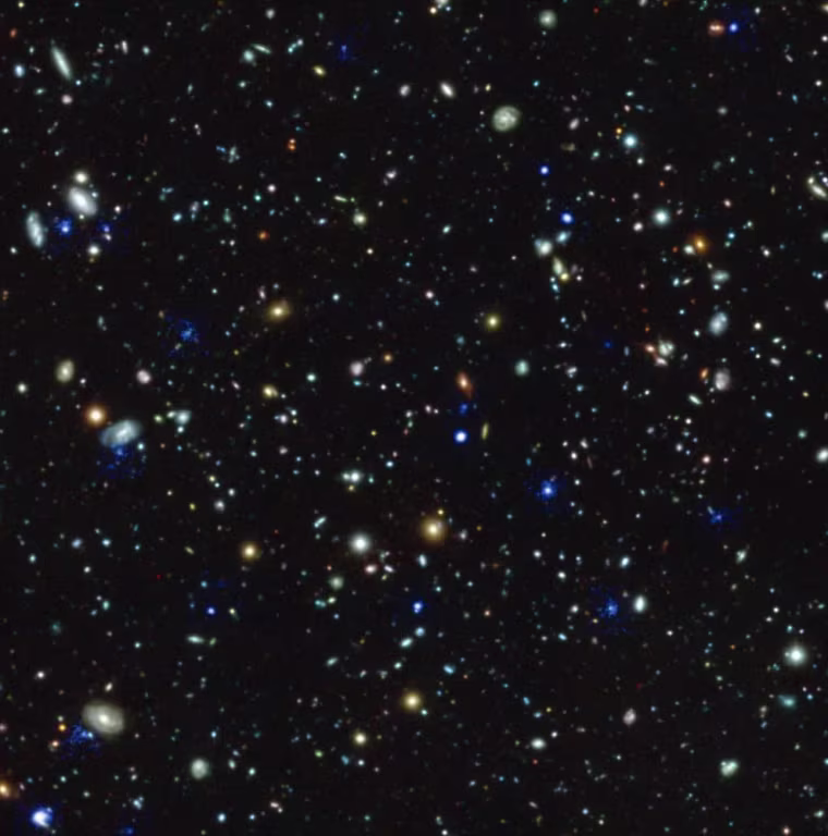 This compound image of the Hubble Ultra Deep Field region depicts glowing halos of gas around galaxies discovered by the Muse instrument on the European Southern Observatory's Very Large Telescope.