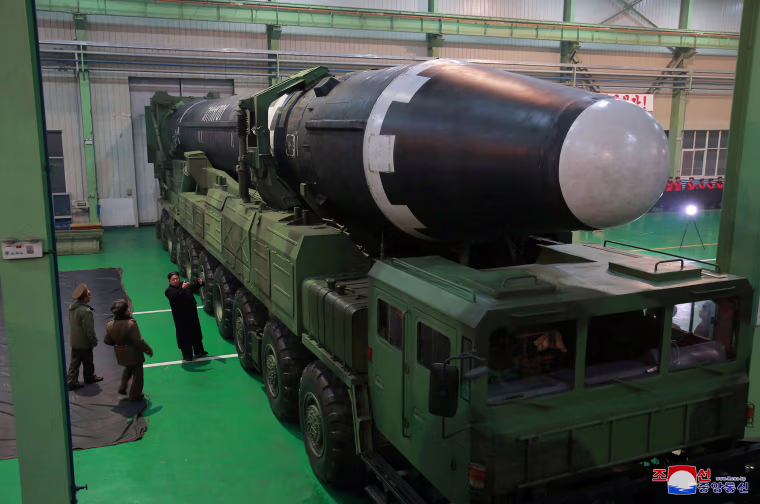 Image: Hwasong-15 and Kim Jong Un