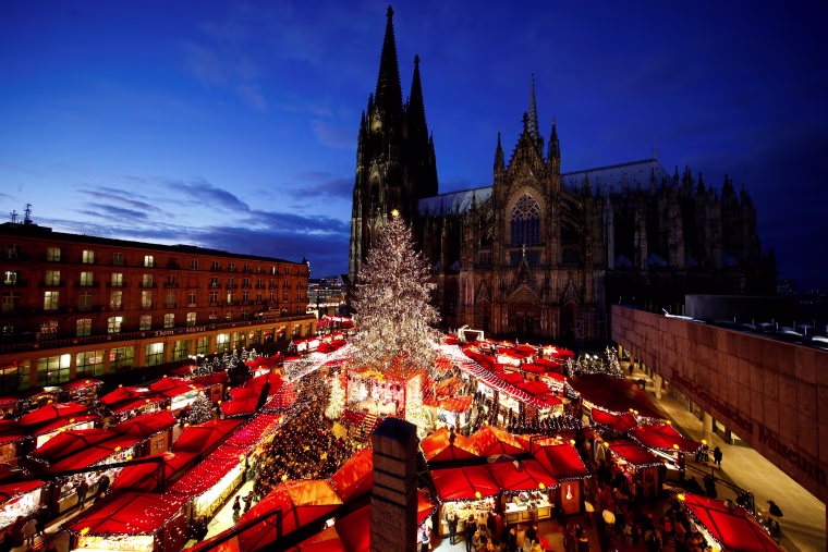Image: A general view of the Christmas market on the square in front of the world famous gothic cathedral in Cologne