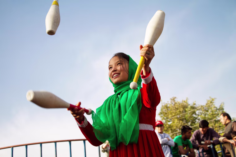 The circus enables the children who join, often from internally displaced communities around Kabul, to learn new skills while continuing their education. Nadia, seen here, is 14 years old, and one of the best girl-performers in the country.