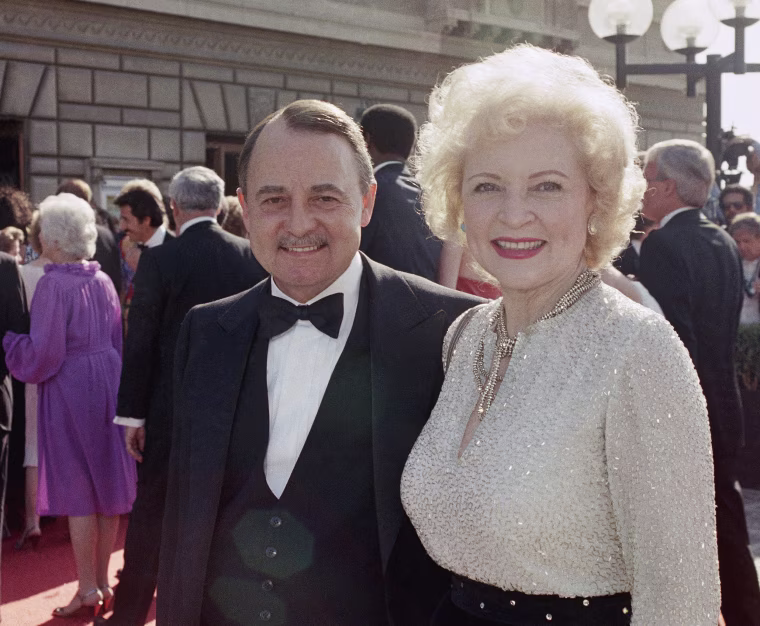 Image: John Hillerman, left, and Betty White, right, arriving at Emmy Awards in Pasadena, California on Sept. 22, 1985.
