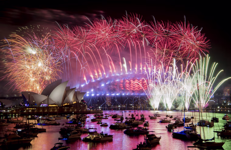 Image: Fireworks explode over the Sydney Harbour during New Year's Eve celebrations in Sydney