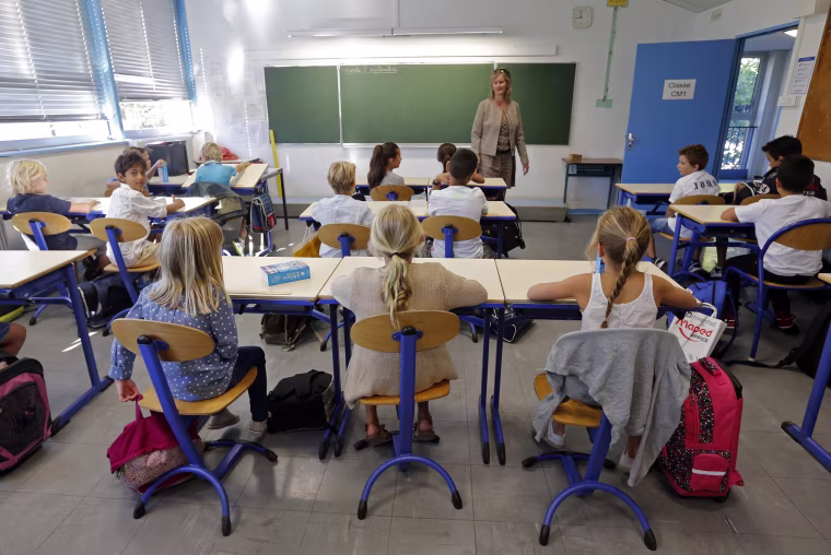 Image: Schoolchildren in a class.