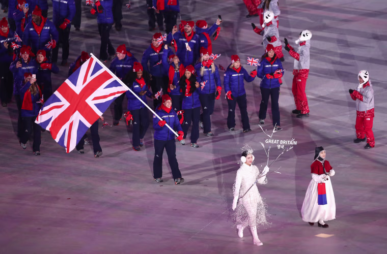Flagbearer Lizzy Yarnold leads the Great Britain delegation.