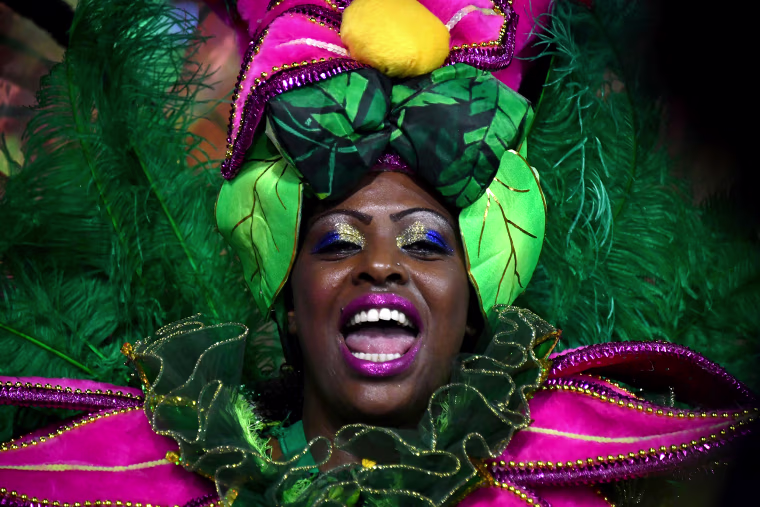 A reveler of the Academicos do Tatuape samba school performs during the first night of carnival in Sao Paulo, Brazil, at the city's Sambadrome early on Feb. 10, 2018.
