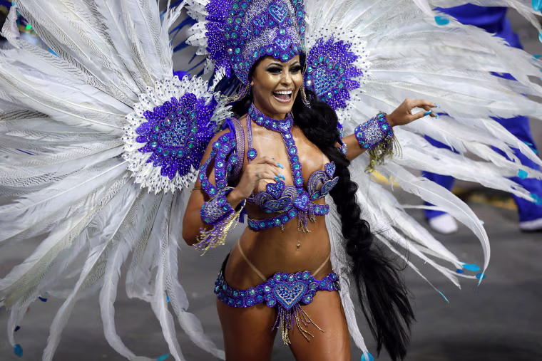 A member of the samba school Grupo Especial Rosas de Ouro takes part in the carnival celebration at the Anhembi sambodrome in Sao Paulo, Brazil, on Feb. 10. 2018.