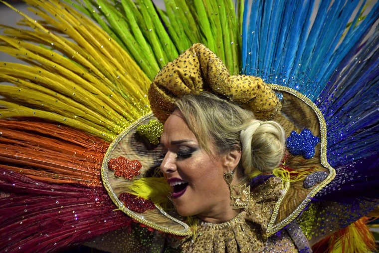 A reveler of the Tom Maior samba school performs during the first night of carnival in Sao Paulo, Brazil, at the city's Sambadrome early on Feb. 10, 2018.
