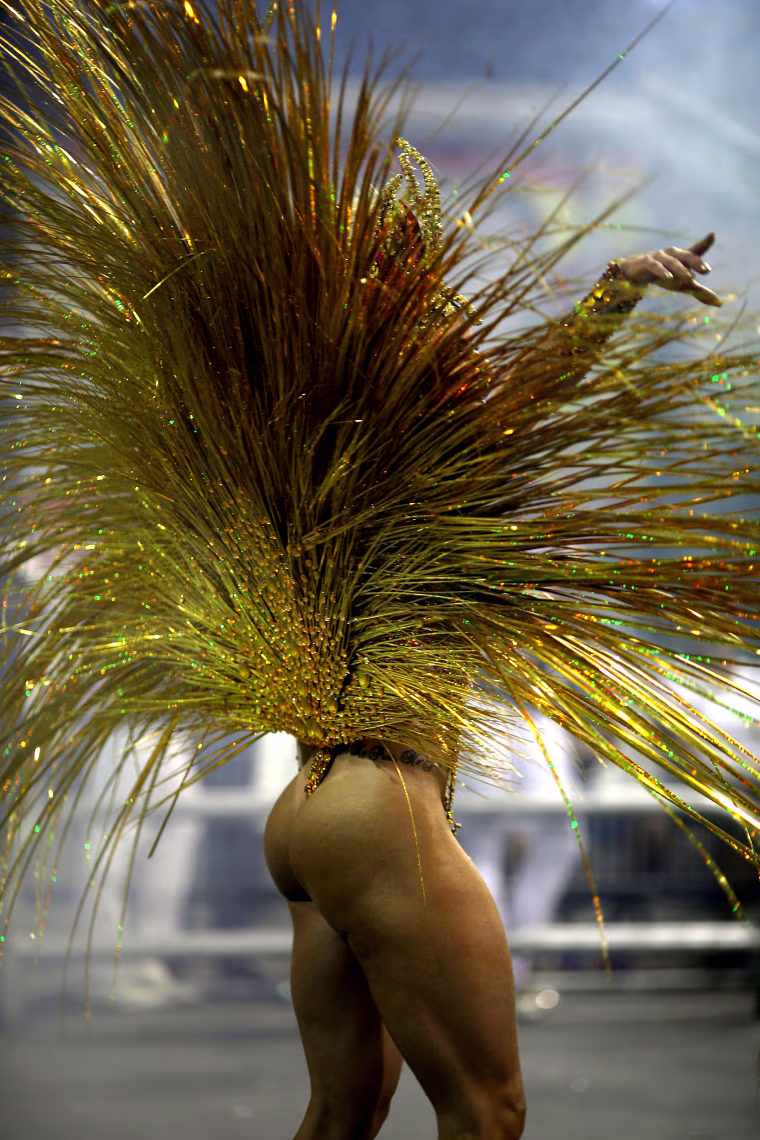 A reveler from the Rosas de Ouro Samba School takes part in a carnival celebration at Anhembi Sambadrome in Sao Paulo, Feb. 10, 2018.