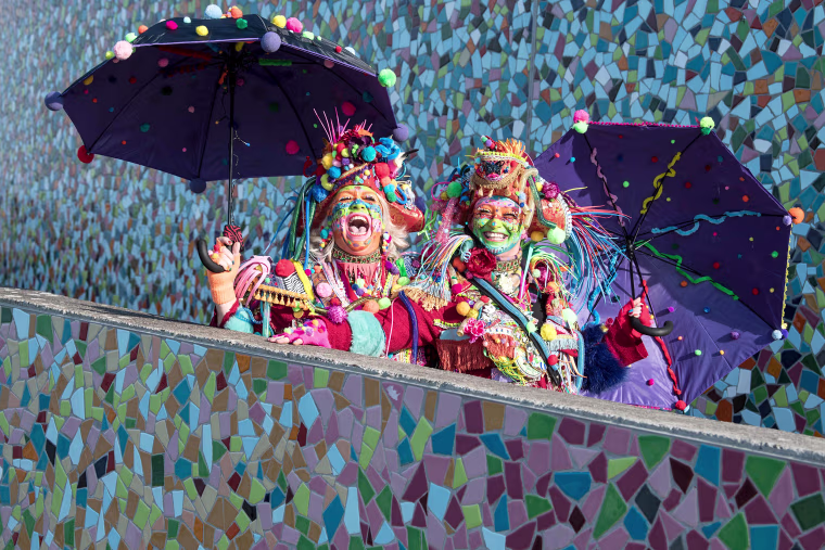 Women celebrate the launch of the hot carnival season on Women's Carnival, Feb. 8, 2018 in Duesseldorf, western Germany.