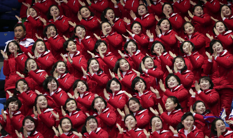 North Korean supporters cheer on Un Song Choe, of North Korea, during the 1,500 meter short-track speed skating on Feb. 10.