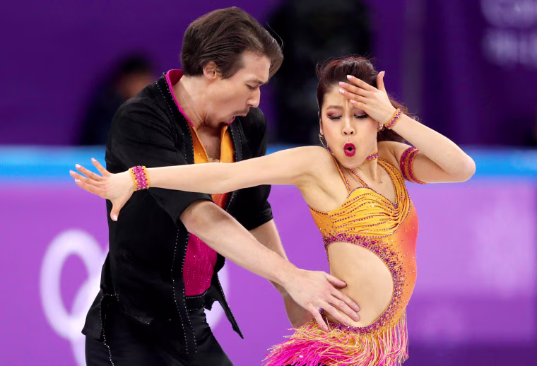 Kana Muramoto and Chris Reed of Japan compete in the team ice dance, short dance event on Feb. 11.
