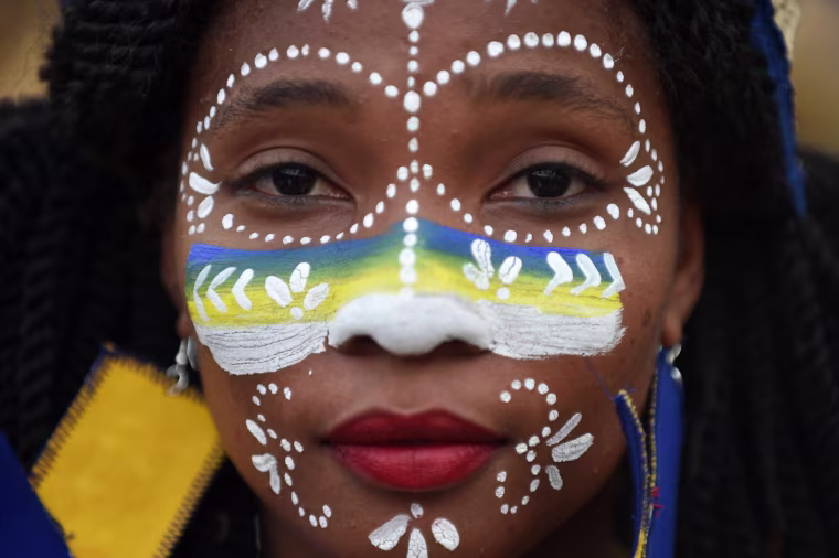 Image: A dancer poses for a picture while performing on the first day of the 2018 National Carnival Parade