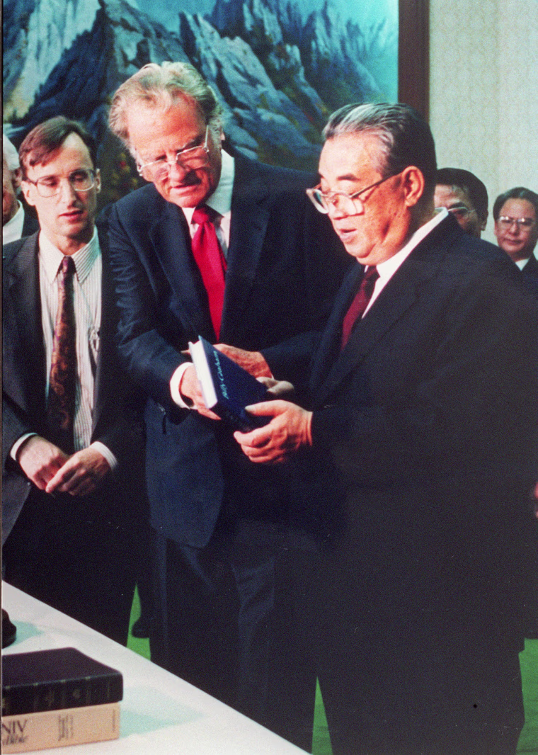 Image: Billy Graham (C), the American evangelist, present