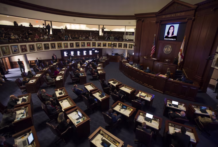 Image: A slideshow of the 17 people killed at Marjory Stoneman Douglas High School, is played at the Florida Capitol in Tallahassee,