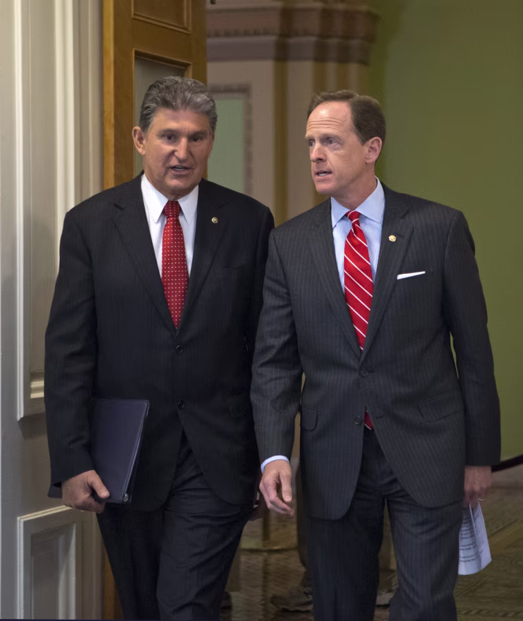 Image: Pat Toomey, Joe Manchin
