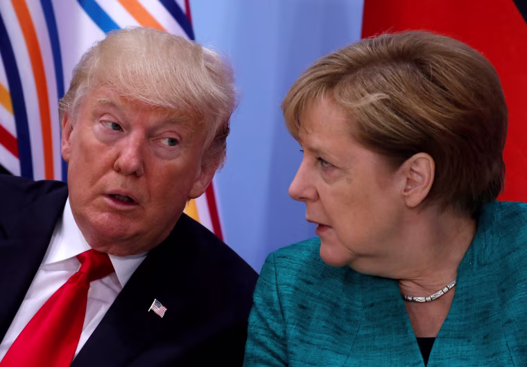 Image: Donald Trump and Angela Merkel spoke by phone after Vladimir Putin boasted of new nuclear-capable weapons.