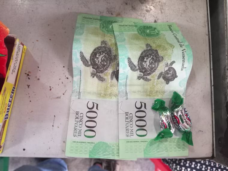 10,000 bolívars (5 U.S cents) only buys two mint candies.